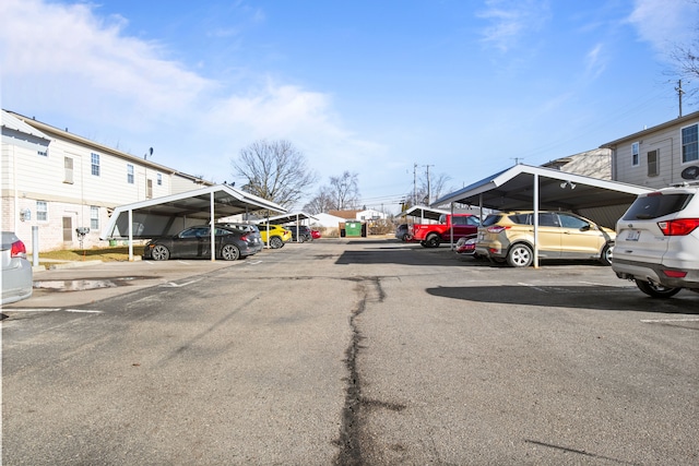 view of partially covered parking lot