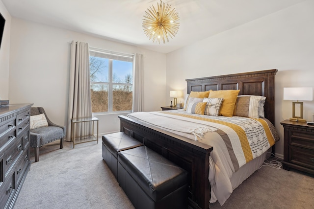 bedroom with light colored carpet and a chandelier