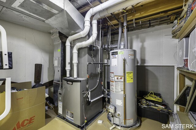 utility room featuring gas water heater and heating unit