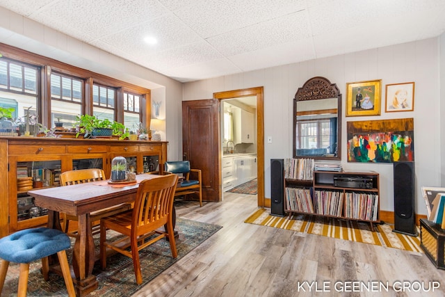 dining space featuring wood finished floors