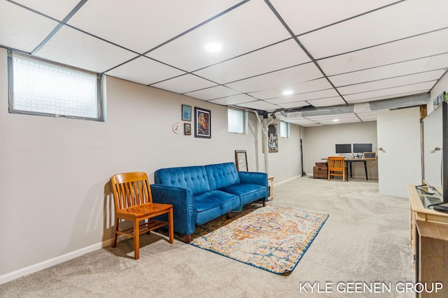 living area with recessed lighting, a drop ceiling, baseboards, and carpet flooring