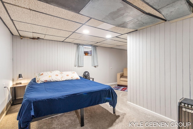 carpeted bedroom featuring baseboards