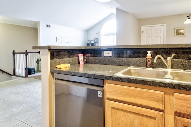 kitchen with visible vents, light tile patterned flooring, a sink, dishwasher, and dark countertops