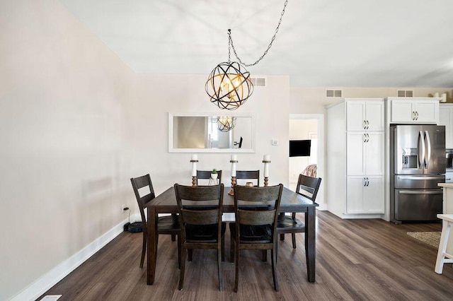 dining space featuring dark wood-type flooring, visible vents, and baseboards