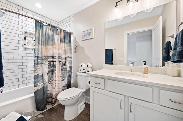 full bathroom featuring tile patterned floors, toilet, vanity, and shower / bath combo