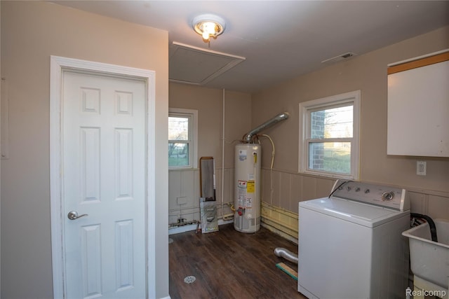 laundry area with visible vents, gas water heater, attic access, laundry area, and washer / clothes dryer