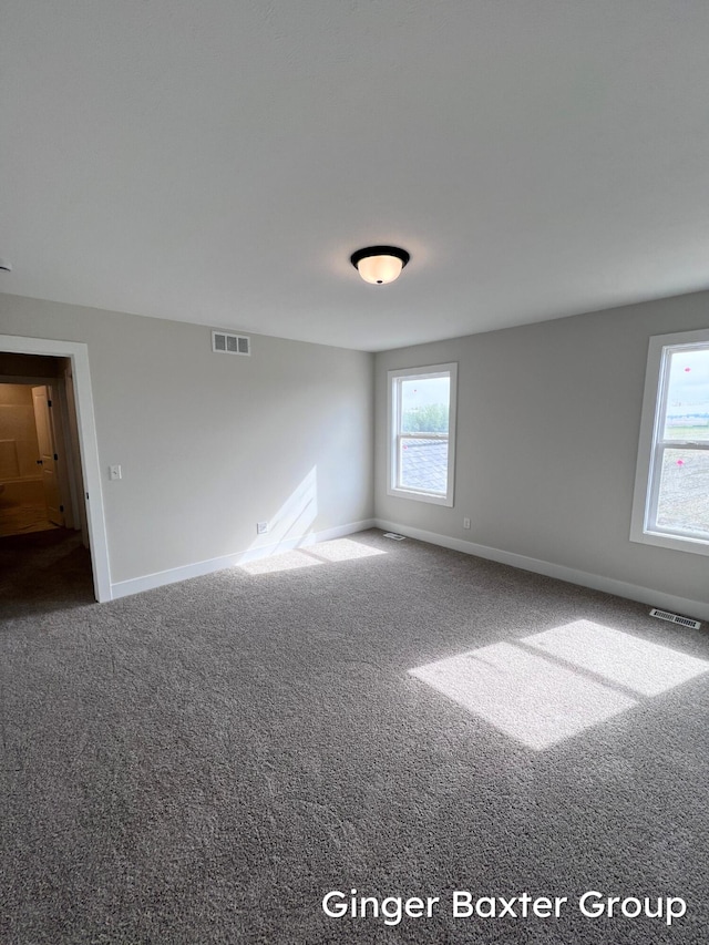 11328 Shoreline Dr Unit 118, Allendale, MI 49401 - unfurnished room with carpet and baseboards
