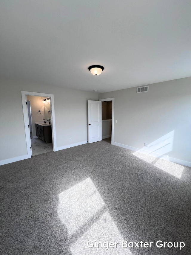 11328 Shoreline Dr Unit 118, Allendale, MI 49401 - carpeted empty room with baseboards