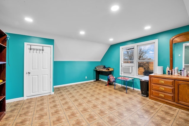 interior space featuring recessed lighting, cooling unit, baseboards, and lofted ceiling