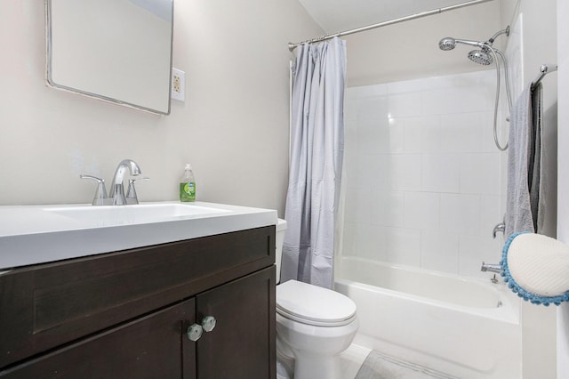 full bathroom with vanity, toilet, and shower / tub combo