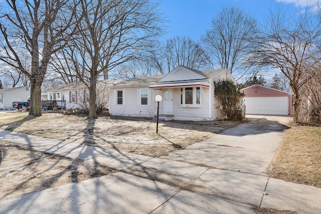 view of front of house with an outbuilding and a garage