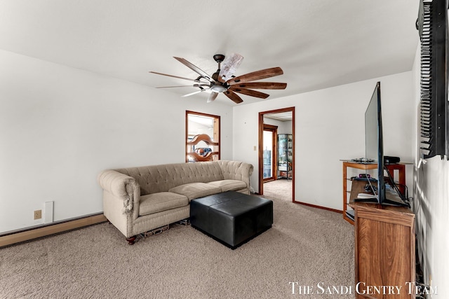 living room featuring a baseboard radiator, baseboards, ceiling fan, and carpet flooring