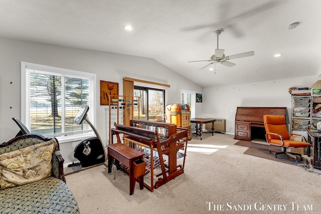 dining area with vaulted ceiling, radiator, plenty of natural light, and light colored carpet