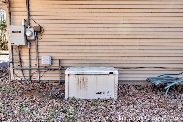 exterior details featuring a power unit and electric meter