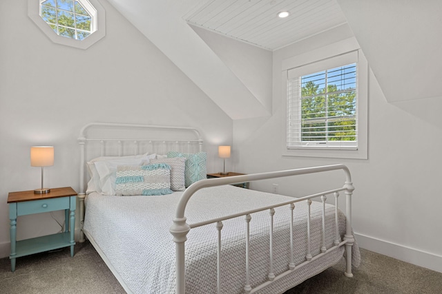 bedroom featuring recessed lighting, baseboards, carpet floors, and lofted ceiling