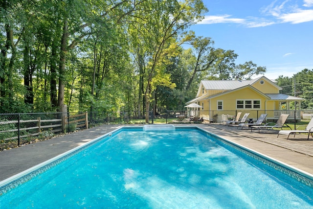 view of pool featuring a fenced in pool, a patio, and fence