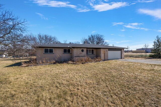 1484 Joslyn Ave, Pontiac, MI 48340 - ranch-style house with a garage, aphalt driveway, a front yard, a chimney, and brick siding