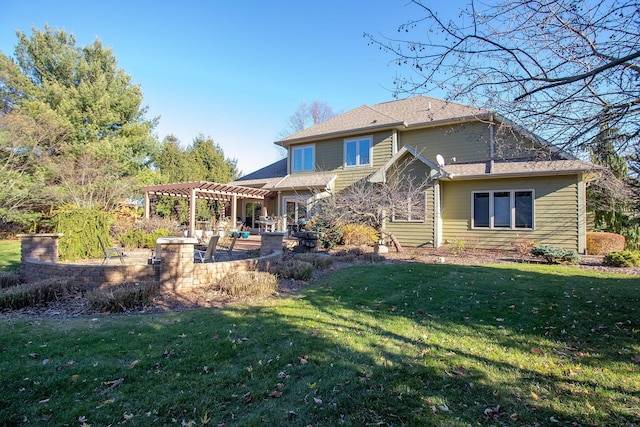 rear view of property with a patio, a lawn, and a pergola