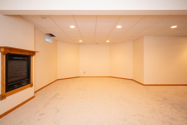 finished basement featuring recessed lighting, baseboards, visible vents, and light carpet