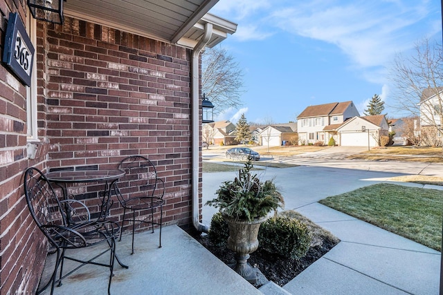 view of patio / terrace featuring a residential view