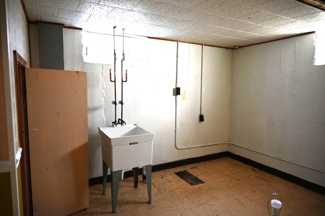 finished basement with tile patterned floors