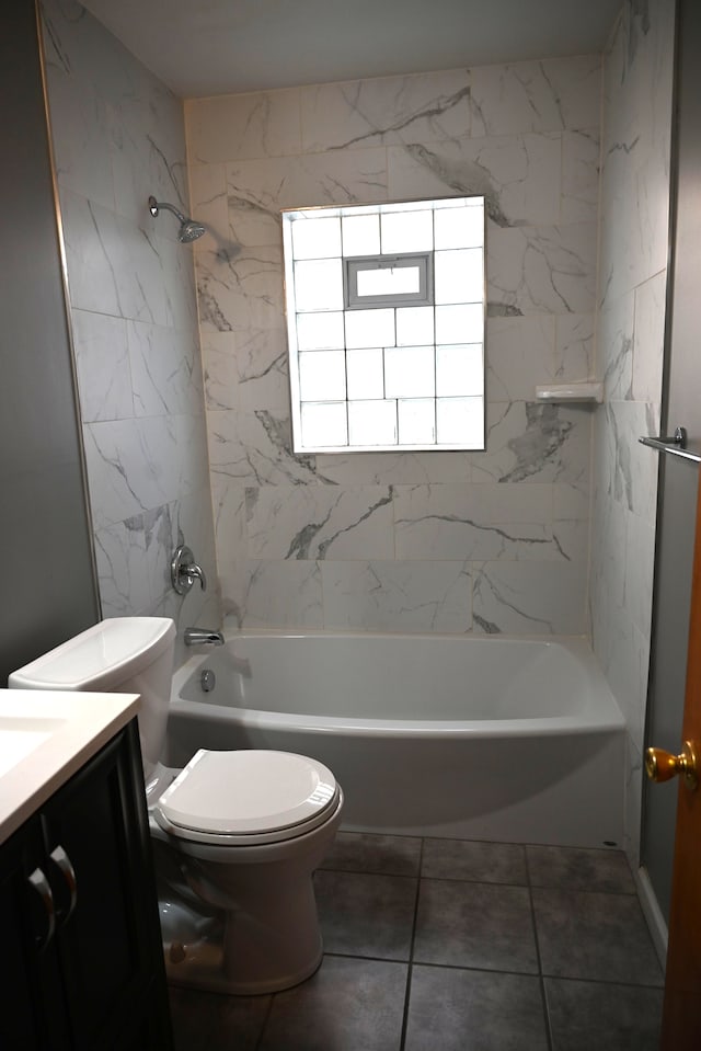 bathroom with toilet, bathtub / shower combination, and vanity