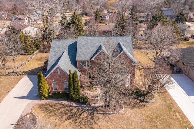 birds eye view of property with a residential view