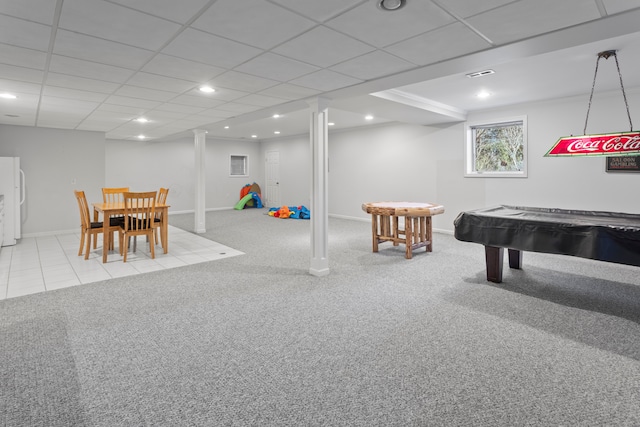 recreation room featuring carpet, visible vents, a drop ceiling, and baseboards