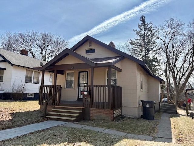 bungalow-style home featuring a porch