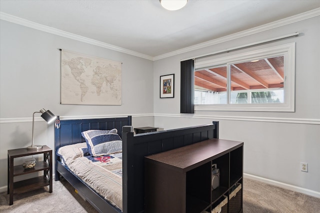 carpeted bedroom with baseboards and ornamental molding