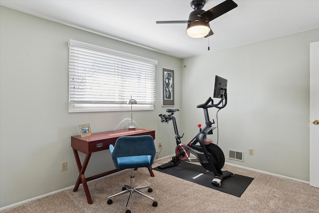 workout room with visible vents, baseboards, carpet, and a ceiling fan