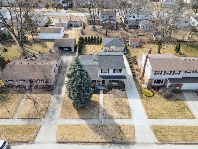 birds eye view of property with a residential view