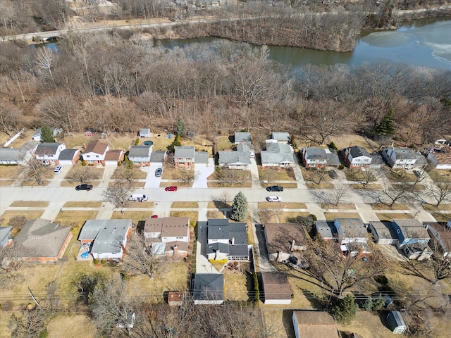 bird's eye view with a residential view and a water view