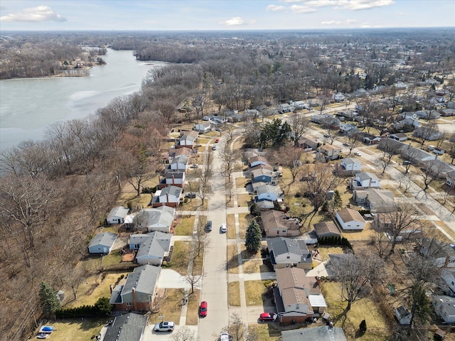 bird's eye view with a residential view and a water view