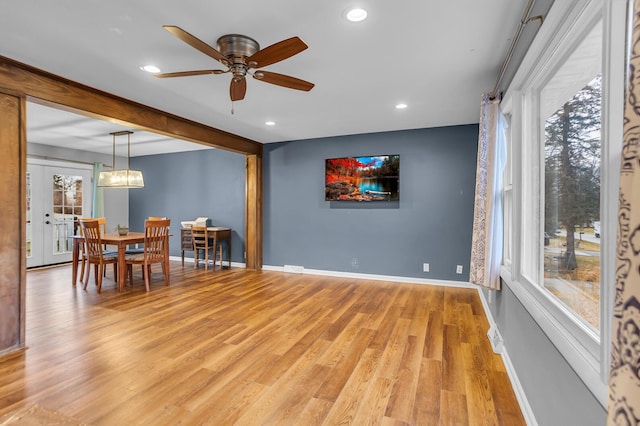 1307 Winston Dr, Jackson, MI 49203 - dining area with baseboards, plenty of natural light, and wood finished floors