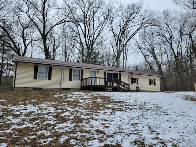 view of front of house with a wooden deck