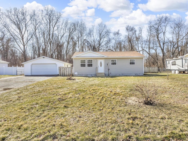 ranch-style home featuring fence, entry steps, a front lawn, an outdoor structure, and a garage