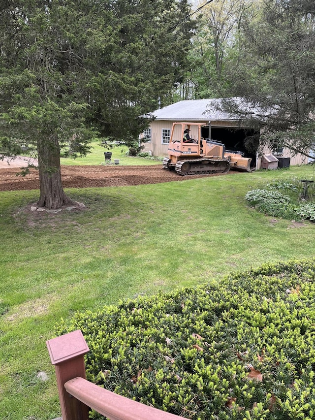 view of yard with a carport