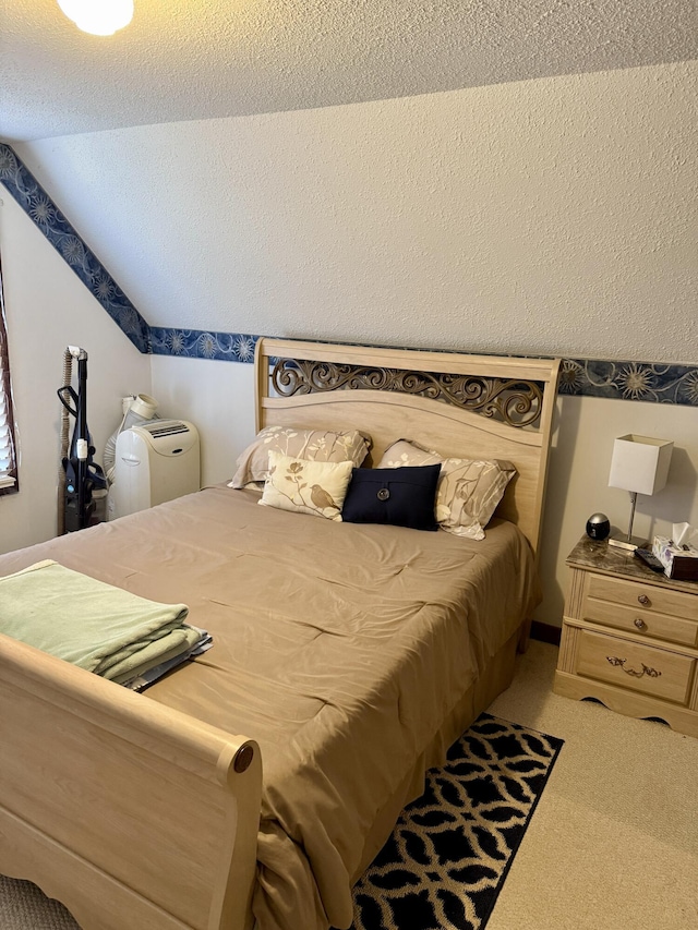 bedroom featuring carpet flooring and vaulted ceiling