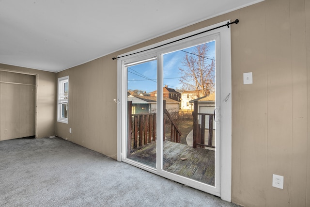 entryway with carpet floors