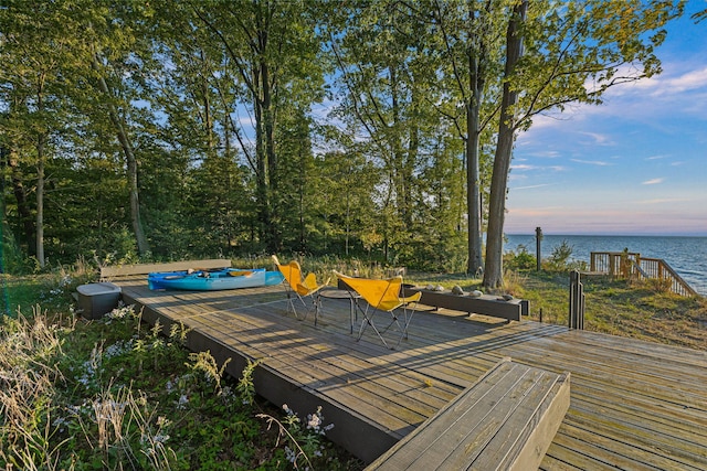 deck at dusk with a water view