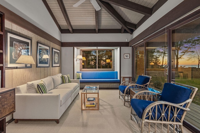 patio terrace at dusk featuring outdoor lounge area and ceiling fan