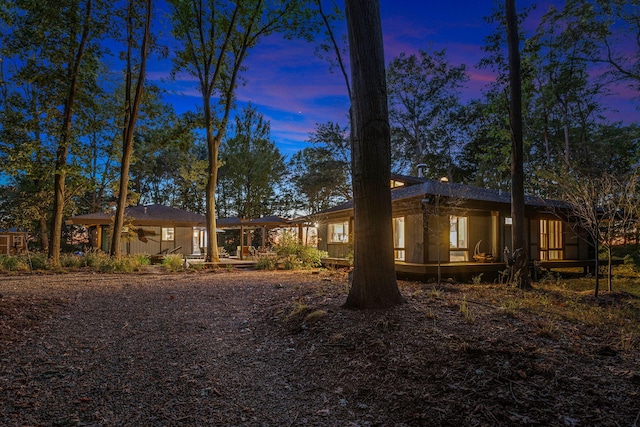 view of front of home with a sunroom