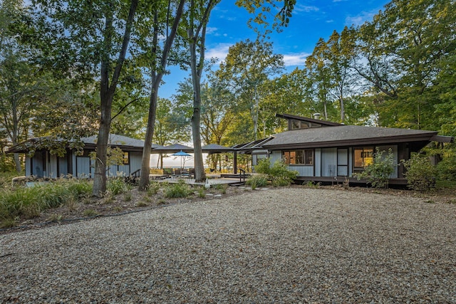 back of house with a patio area