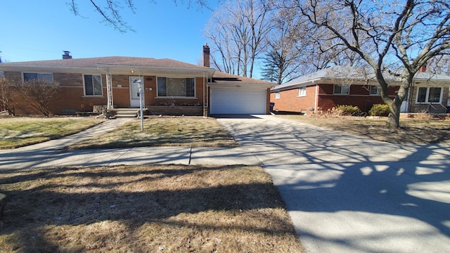 ranch-style home featuring an attached garage, brick siding, driveway, and a chimney