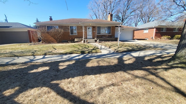 single story home featuring brick siding, concrete driveway, and a chimney