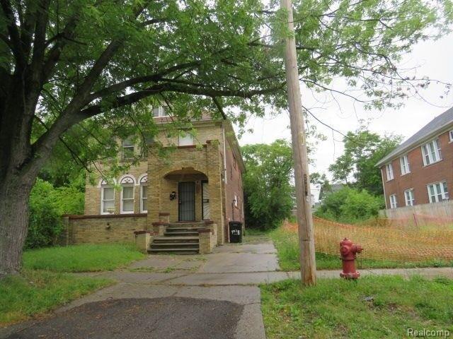 view of front of property with brick siding