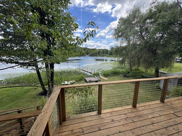 wooden terrace with a water view