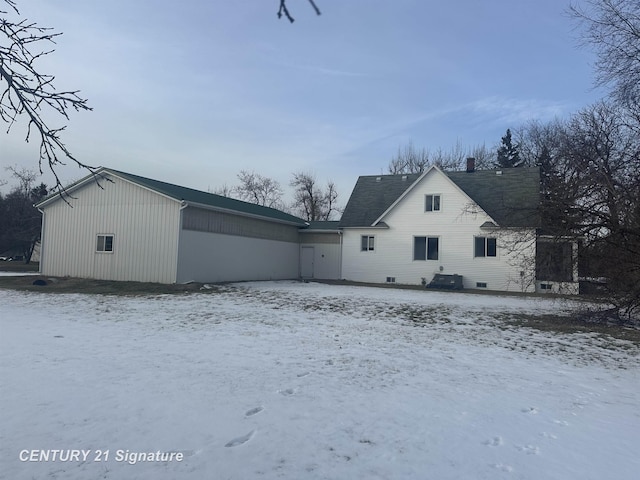 view of snow covered property