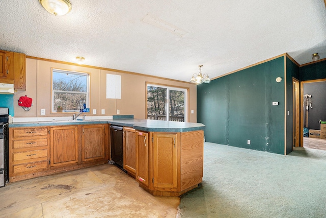 kitchen with a peninsula, black dishwasher, brown cabinets, and plenty of natural light